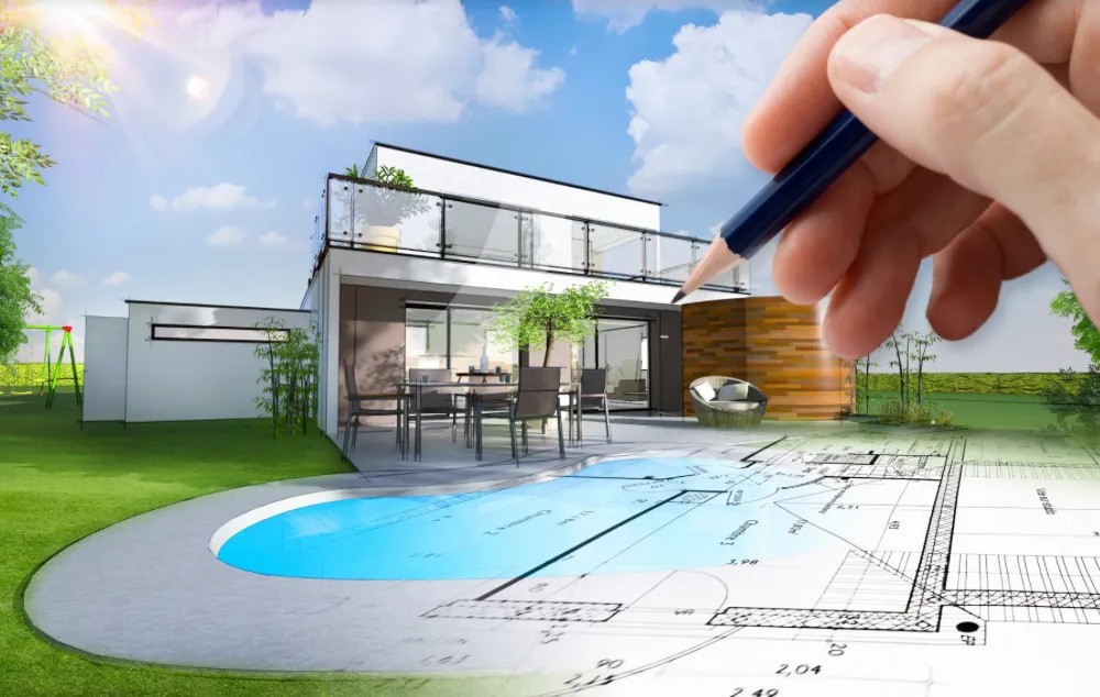 A hand sketching a house with a swimming pool on a blank surface.